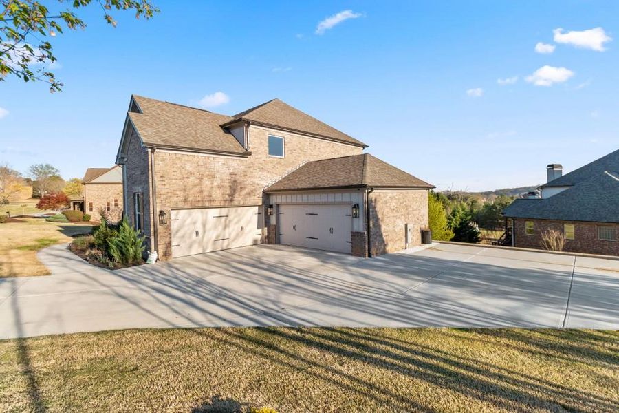 Front exterior of a new home in , Flowery Branch, GA, highlighting curb appeal (Image 31).