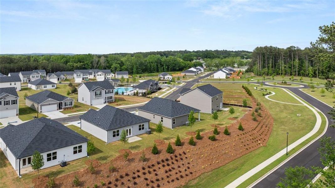 Exterior details and patio area of a home in Champion's Run, Lithonia (Image 4).