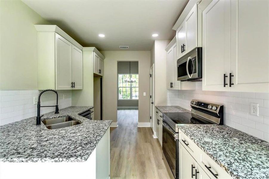 Furnished interior view inside a new home in , Conyers (Image 3).