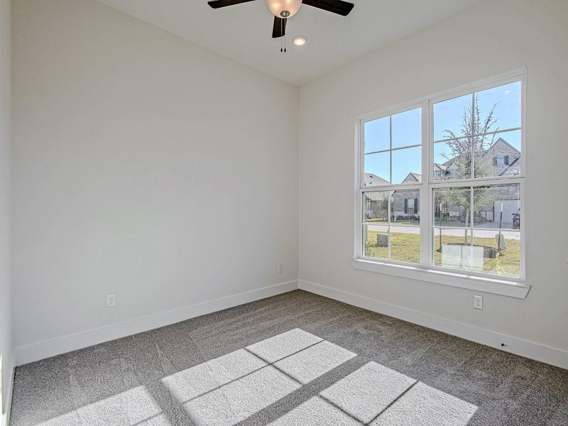 Bedroom or flex space with window and natural light.