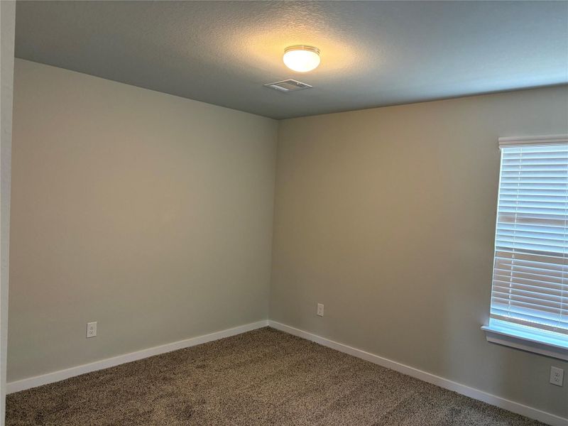 Spacious, unfurnished interior of a new home in Morton Creek Ranch, Katy (Image 29).