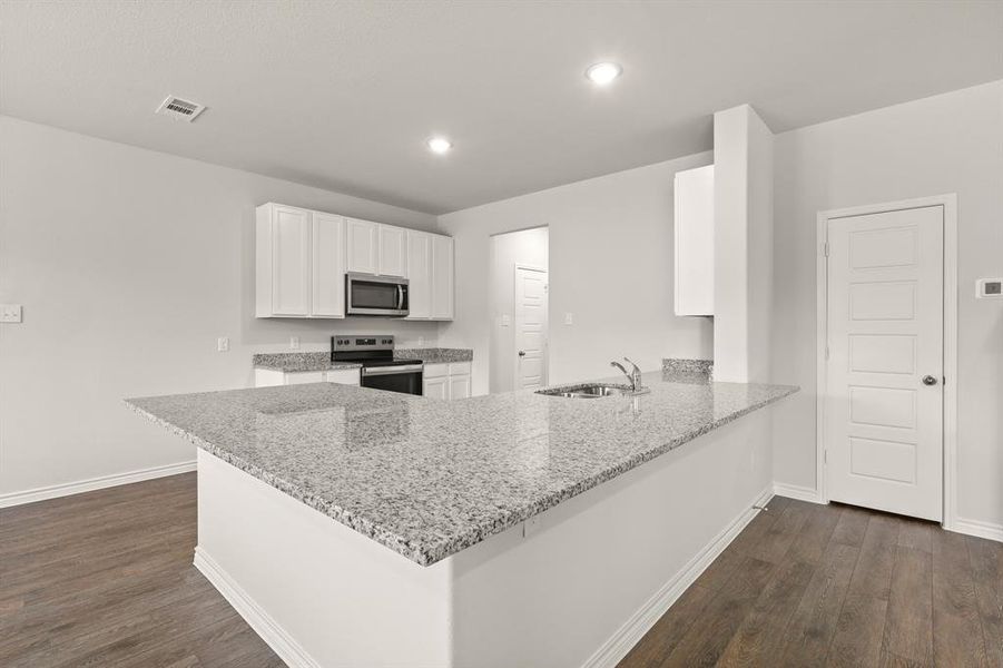 Furnished interior view inside a new home in Christian Meadows, Ennis (Image 18).