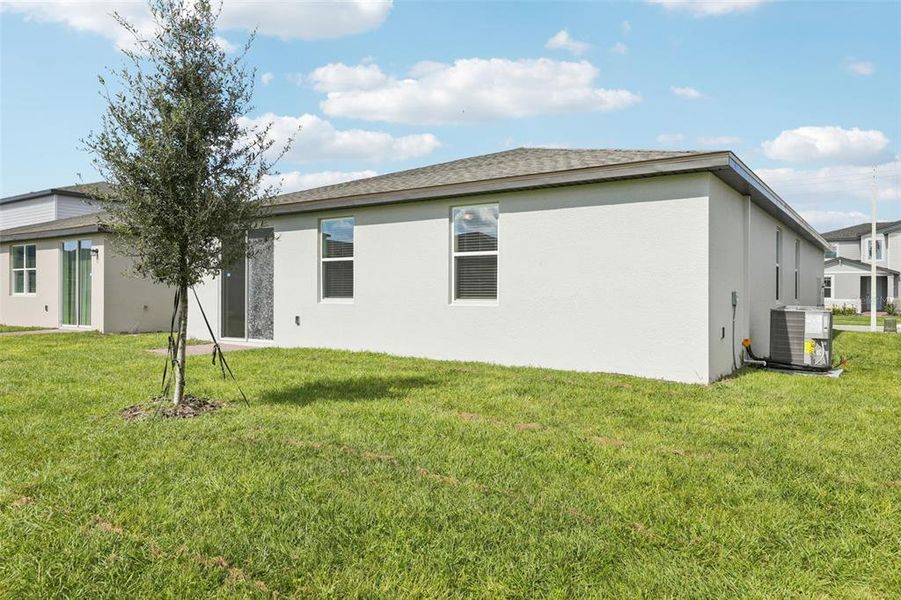 Exterior details and patio area of a home in Lawson Dunes - Signature Series, Haines City (Image 3).