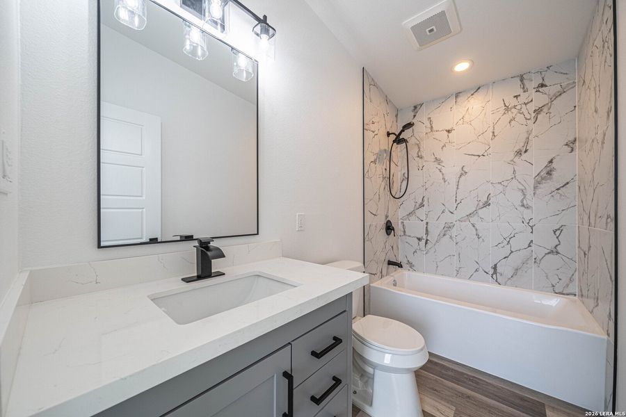 Furnished interior view inside a new home in , New Braunfels (Image 12).