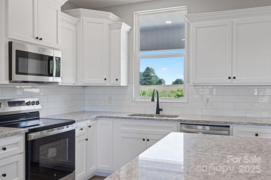 Furnished interior view inside a new home in , Vale (Image 7). Furnished interior view inside a new home in , Vale (Image 7).