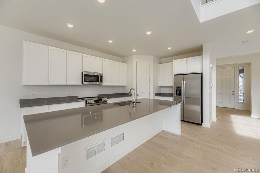 Furnished interior view inside a new home in Ken-Caryl Ranch: The Monarch Collection, Littleton (Image 4).