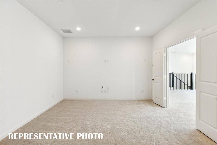 Your new media room and adjacent game room create the ultimate space to host big game day parties!  REPRESENTATIVE PHOTO