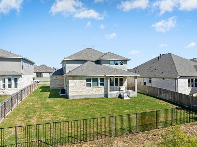 Exterior details and patio area of a home in Santa Rita Ranch, Georgetown (Image 21).
