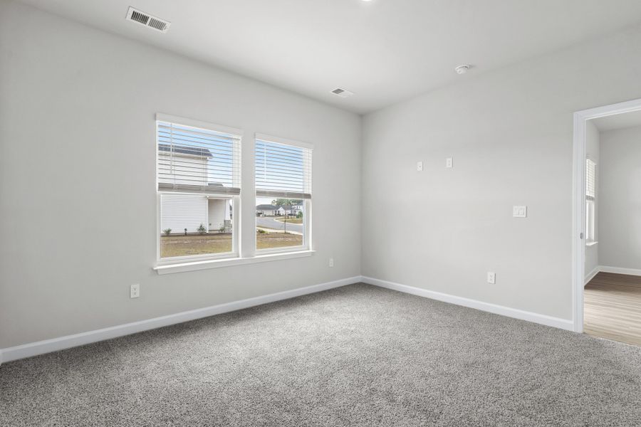Spacious, unfurnished interior of a new home in Cypress Ridge - The Boardwalk Series, Longs (Image 21).