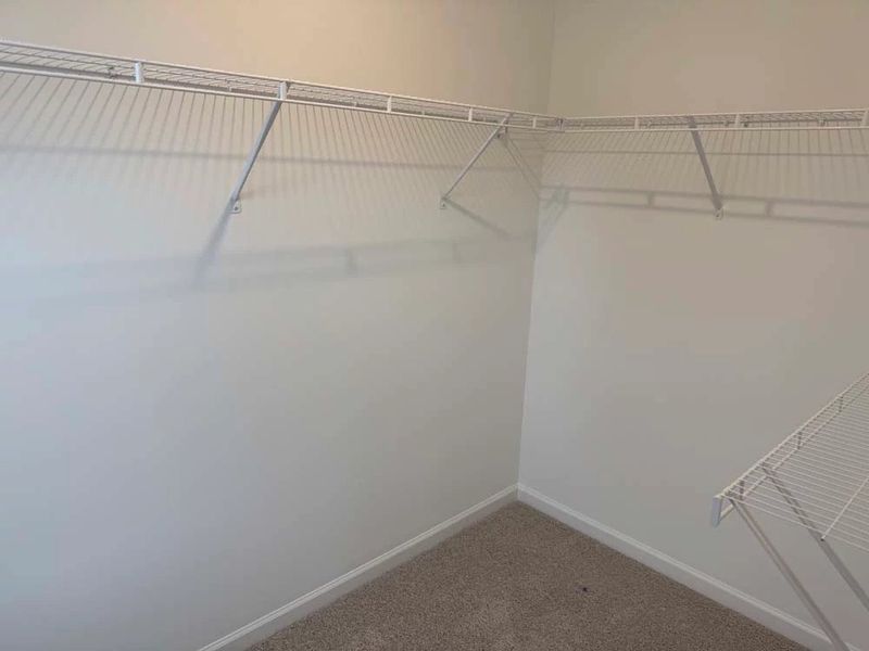 Primary Bedroom Walk-In Closet