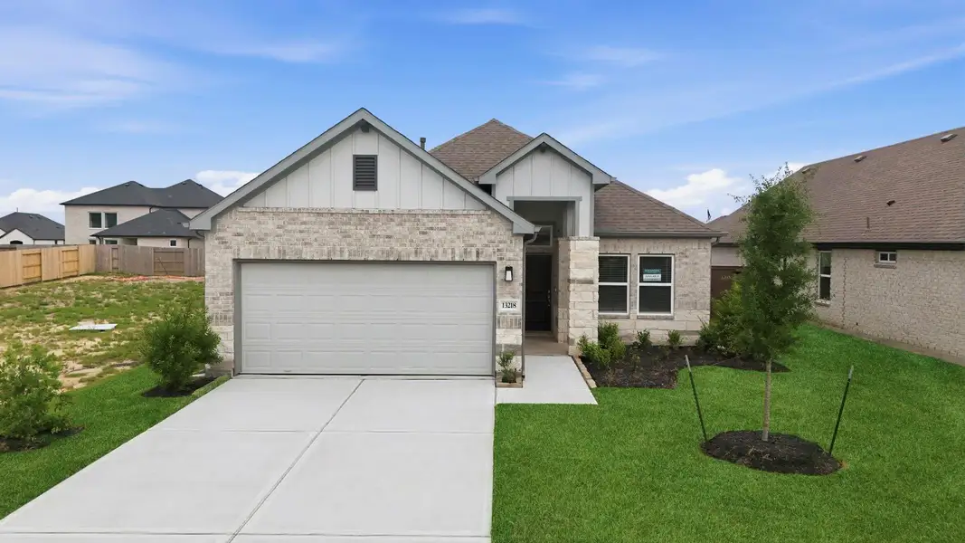 Front exterior of a new home in Creekhaven, Iowa Colony, TX, highlighting curb appeal (Image 1). Front exterior of a new home in Creekhaven, Iowa Colony, TX, highlighting curb appeal (Image 1).