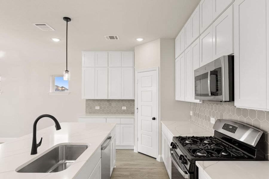 Furnished interior view inside a new home in Creekside, Royse City (Image 11).