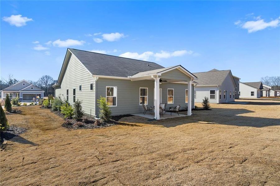 Exterior details and patio area of a home in Saddle Ridge, Calhoun (Image 22).
