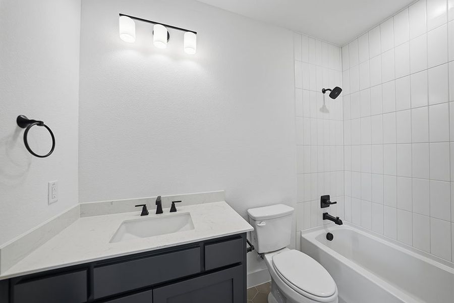 Furnished interior view inside a new home in Light Farms Graham/Reagan, Celina (Image 19).