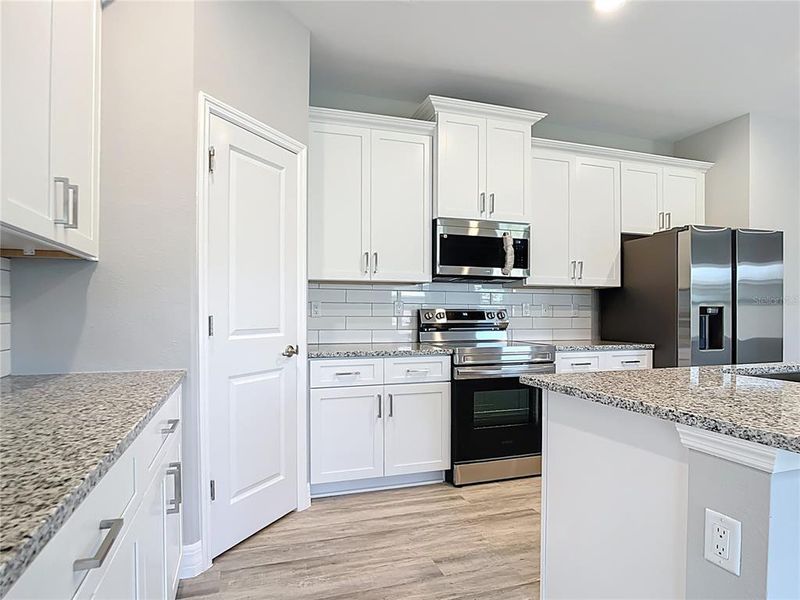 Furnished interior view inside a new home in , North Port (Image 9).