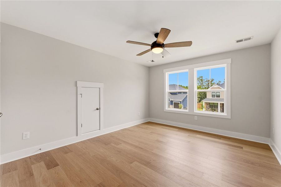 Naturally illuminated by dual windows, this room f
