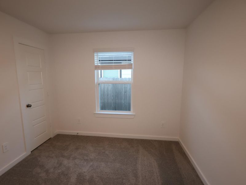 Spacious, unfurnished interior of a new home in Pinewood at Grand Texas, New Caney (Image 24).