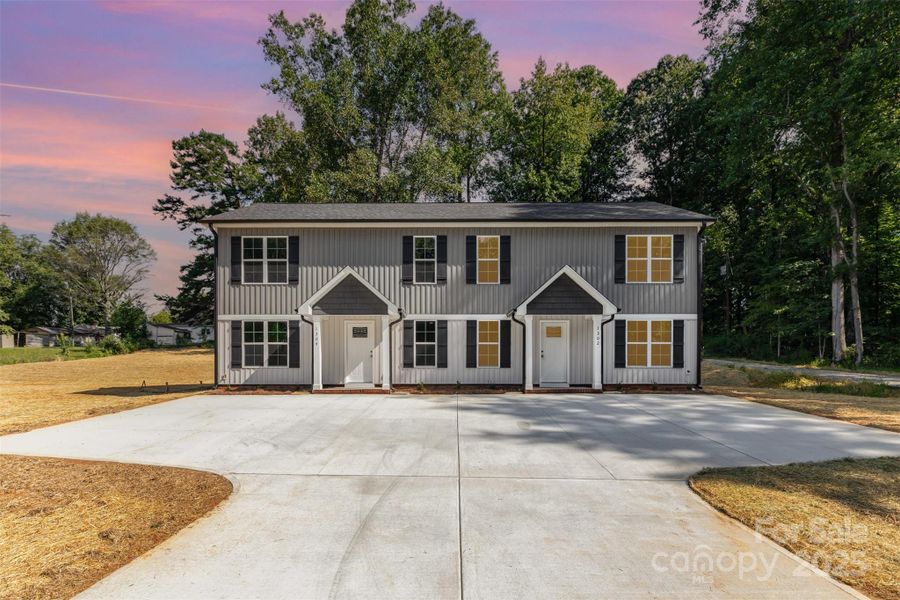 Front exterior of a new home in , Kannapolis, NC, highlighting curb appeal (Image 15).