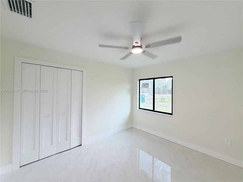 Spacious, unfurnished interior of a new home in , Lehigh Acres (Image 39).