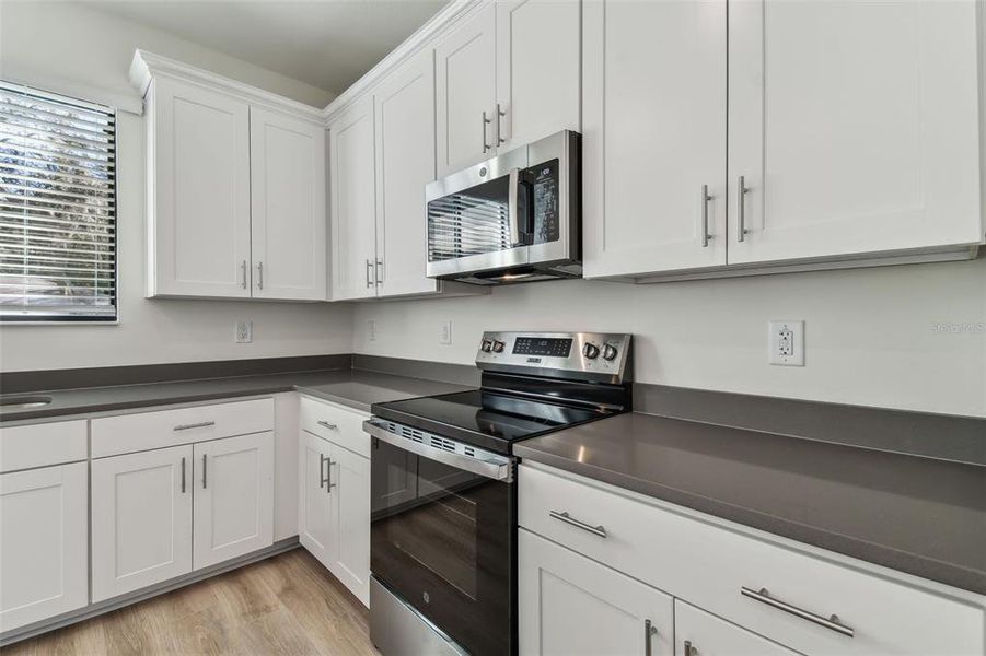 Photos are not the home listed, but same floor plan.