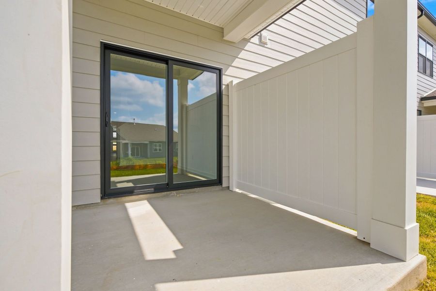 Exterior details and patio area of a home in Nexus Townhomes, Gallatin (Image 4). Exterior details and patio area of a home in Nexus Townhomes, Gallatin (Image 4).