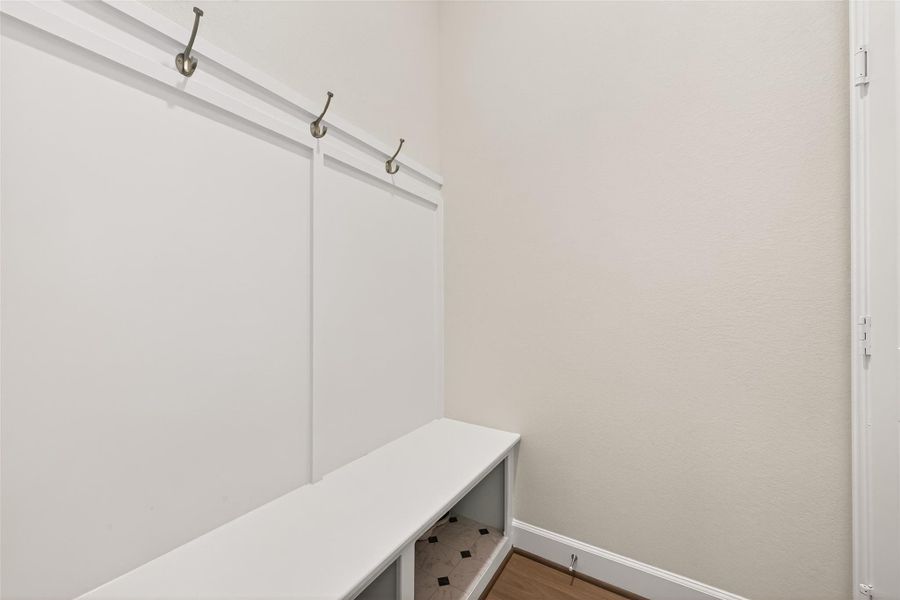Convenient mud room designed to keep everyday essentials organized, with dedicated space for shoes, jackets, backpacks, and seasonal gear Convenient mud room designed to keep everyday essentials organized, with dedicated space for shoes, jackets, backpacks, and seasonal gear