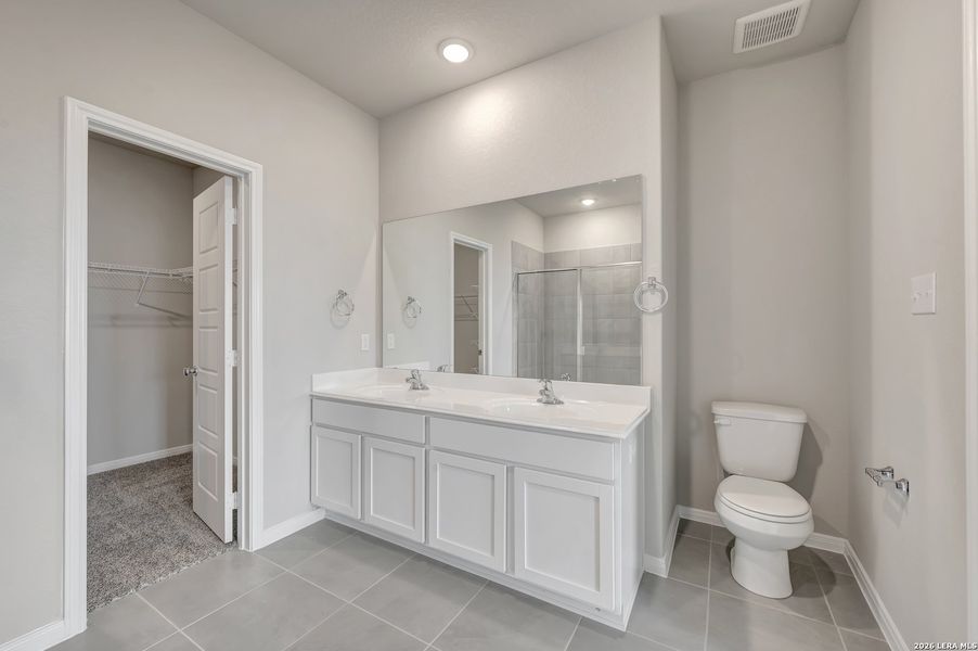 Furnished interior view inside a new home in Hunters Ranch, San Antonio (Image 5).