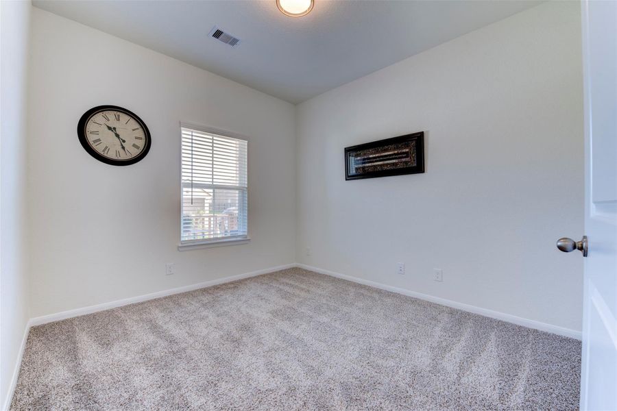 Spacious, unfurnished interior of a new home in Sunterra, Katy (Image 24).