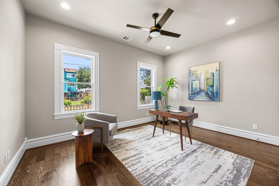 The 2nd of 2 downstairs bedrooms is currently staged as a home office, but could easily be used for a bedroom or hobby/game room. The 2nd of 2 downstairs bedrooms is currently staged as a home office, but could easily be used for a bedroom or hobby/game room.
