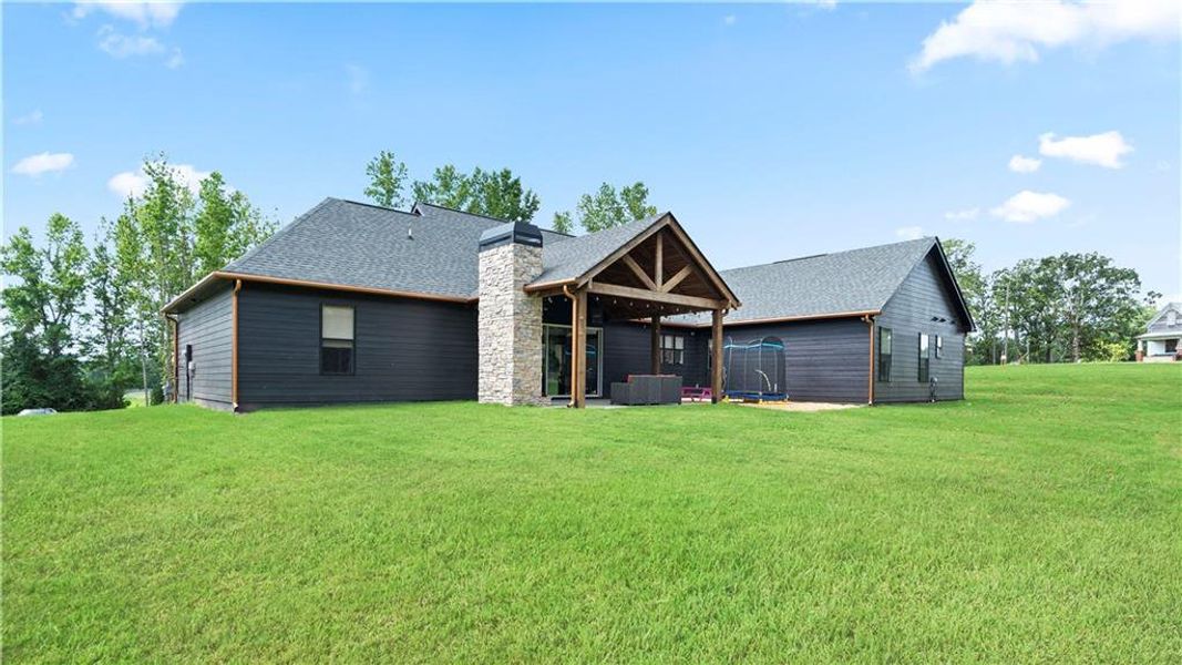 Front exterior of a new home in , Temple, GA, highlighting curb appeal (Image 1). Front exterior of a new home in , Temple, GA, highlighting curb appeal (Image 1).