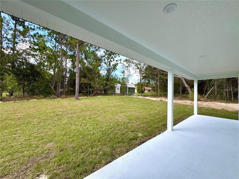 Exterior details and patio area of a home in , Citrus Springs (Image 16).