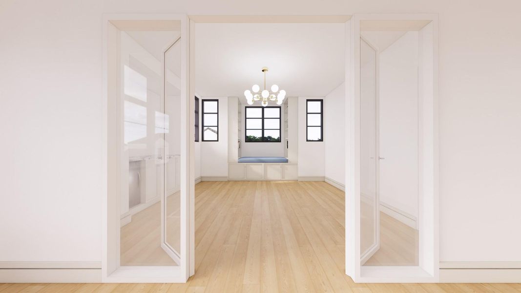 The second floor game room is large enough for game tables and a sitting area. Enjoy custom built-ins and a snack bar.