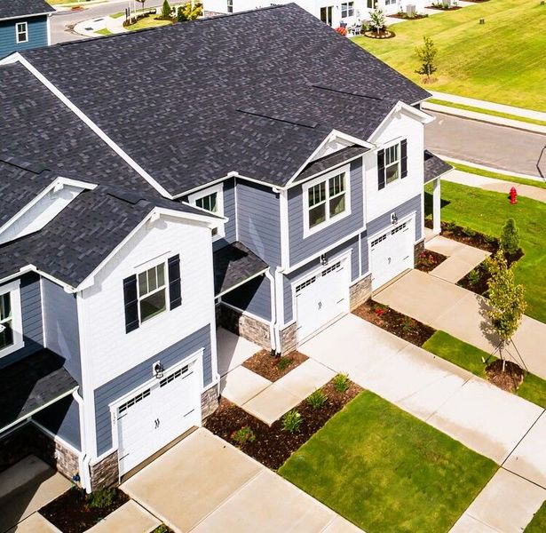 Front exterior of a new home in Vaughan Farms, Angier, NC, highlighting curb appeal (Image 2). Front exterior of a new home in Vaughan Farms, Angier, NC, highlighting curb appeal (Image 2).