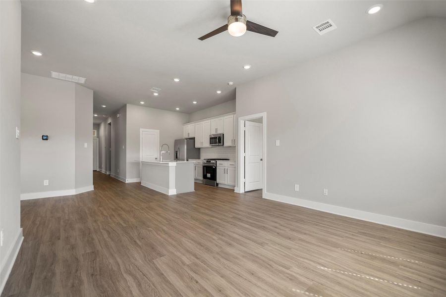 Spacious family room offering an open layout perfect for gatherings or relaxing evenings. Spacious family room offering an open layout perfect for gatherings or relaxing evenings.