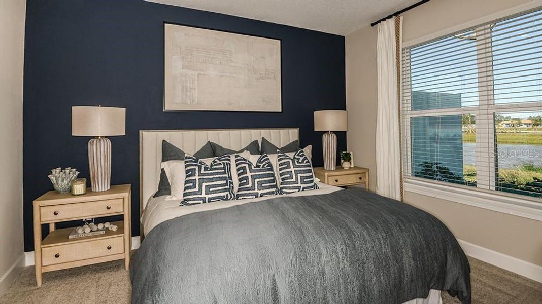 Furnished interior view inside a new home in Esplanade at McKinnon Groves, Winter Garden (Image 4).