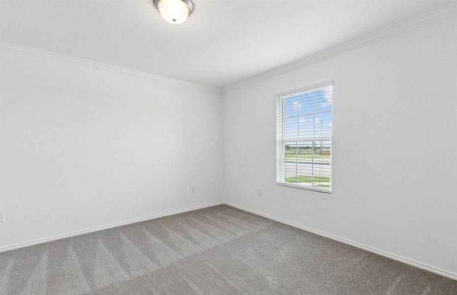 Spacious secondary bedroom with large windows Spacious secondary bedroom with large windows