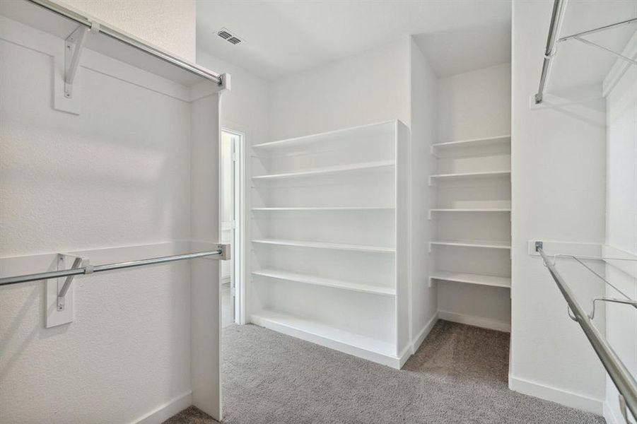 Primary Closet in the Henley home plan by Trophy Signature Homes – REPRESENTATIVE PHOTO Primary Closet in the Henley home plan by Trophy Signature Homes – REPRESENTATIVE PHOTO
