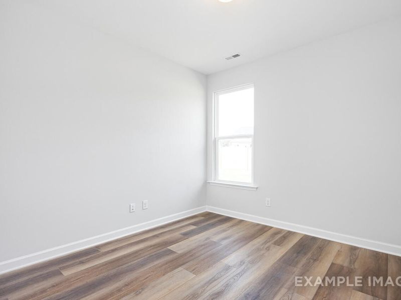 Spacious, unfurnished interior of a new home in Woodland Crossing, Zebulon (Image 12).