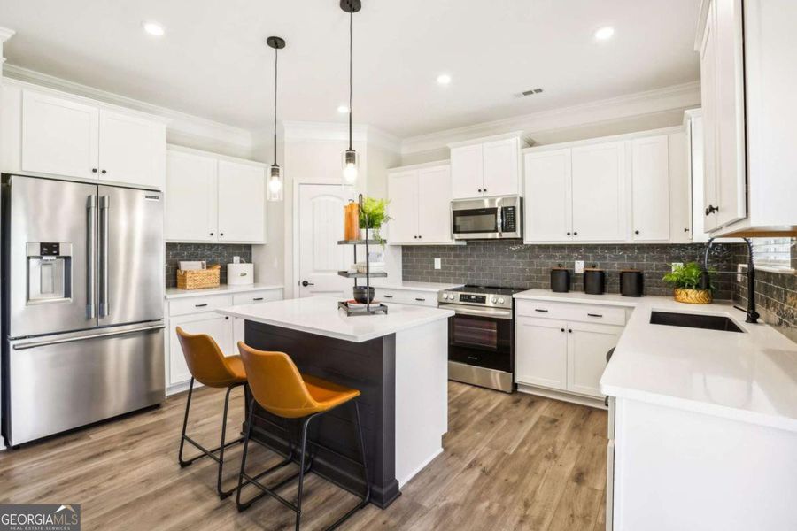 Furnished interior view inside a new home in Cobblestone Crossing Commons, Warner Robins (Image 9).