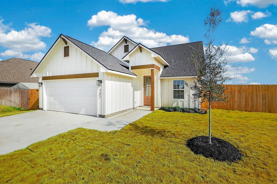 Front exterior of a new home in , Snook, TX, highlighting curb appeal (Image 2). Front exterior of a new home in , Snook, TX, highlighting curb appeal (Image 2).