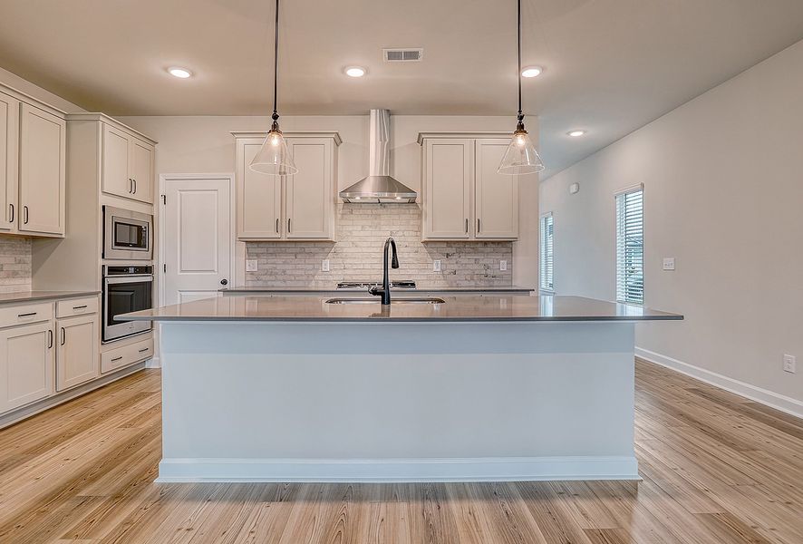 Representative furnished interior of a home built from the Washington by Ashton Woods in Watson Hill, Summerville (Image 3).