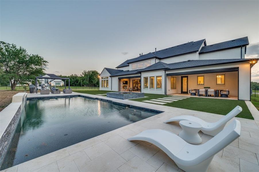 Exterior details and patio area of a home in , Oak Point (Image 23).