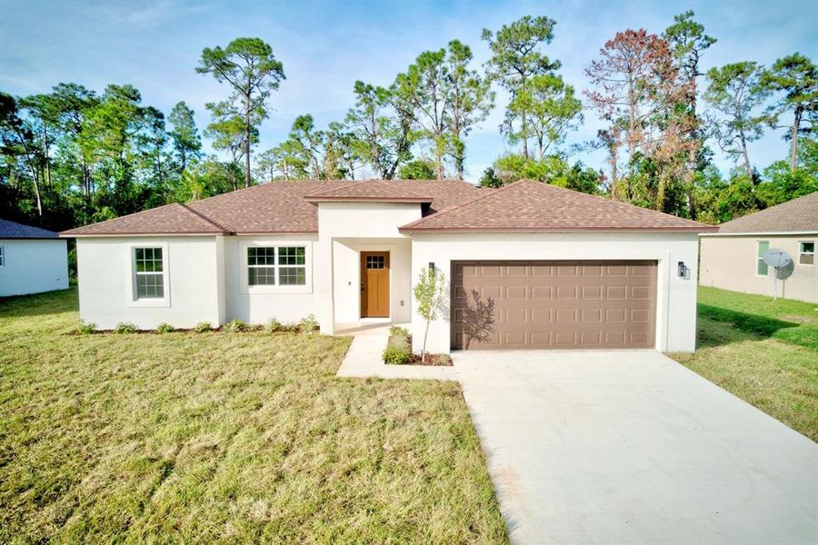 Front exterior of a new home in , Sebring, FL, highlighting curb appeal (Image 1).