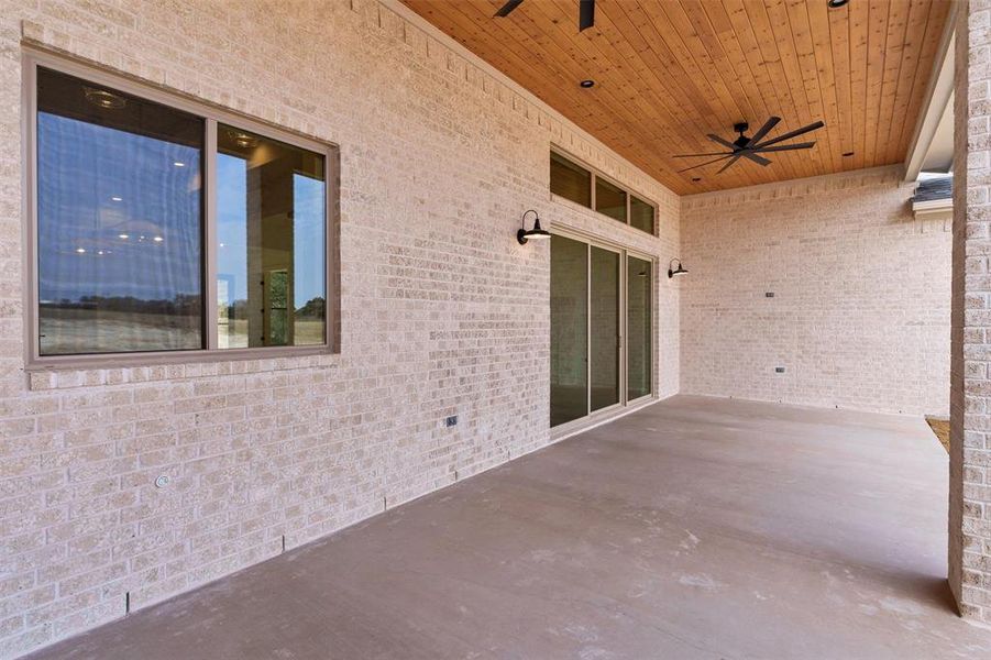 Exterior details and patio area of a home in , Granbury (Image 28).