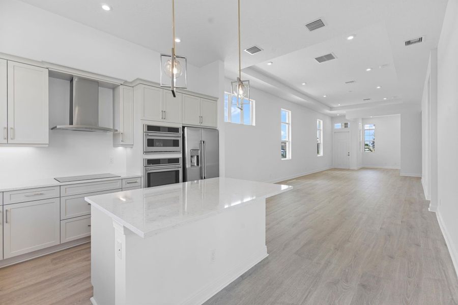 Furnished interior view inside a new home in PGA Village Verano, Port St. Lucie (Image 5).