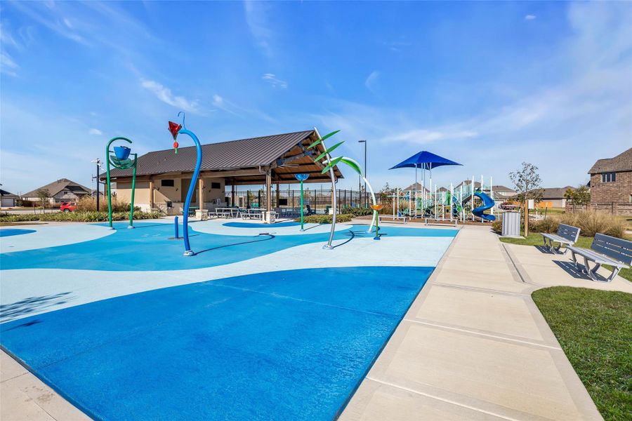 Neighborhood recreation area with splash pad, playground, and pavilion seating, providing a built-in extension of the community lifestyle. Neighborhood recreation area with splash pad, playground, and pavilion seating, providing a built-in extension of the community lifestyle.