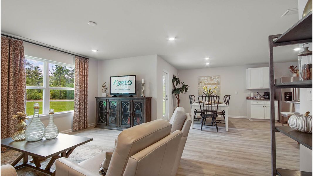 Representative furnished interior of a home built from the Cali by D.R. Horton in Owl's Head East, Freeport (Image 11).