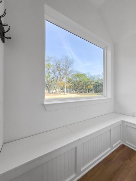 Plenty of storage for boots and coats in this mud room. Plenty of storage for boots and coats in this mud room.