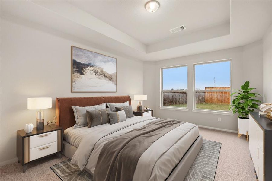 The primary bedroom is generously sized, creating a tranquil and spacious retreat that offers ample room for relaxation. Featuring plush carpet, high ceilings, fresh paint, and large windows that lets in natural lighting throughout the day.