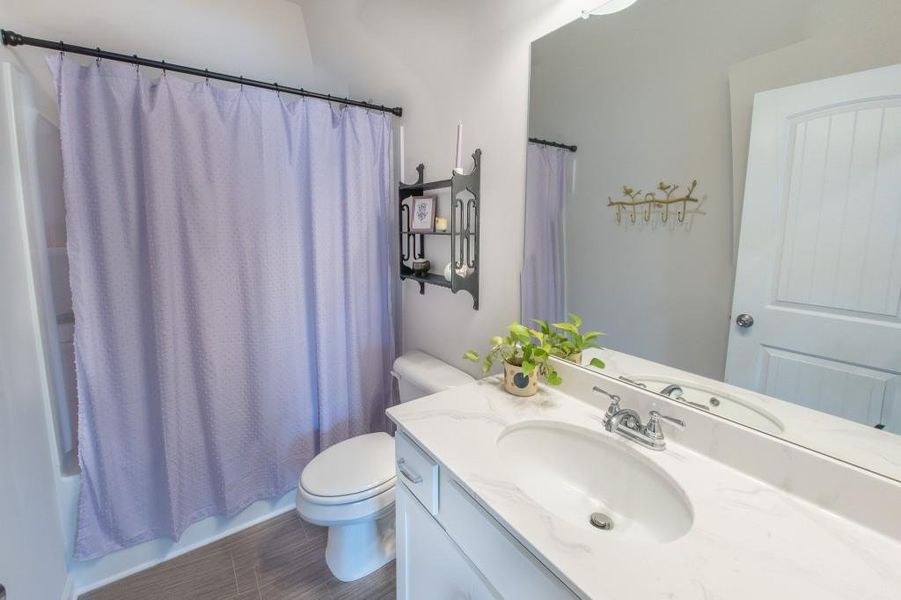 Furnished interior view inside a new home in Ellison Square, Sugar Hill (Image 18).